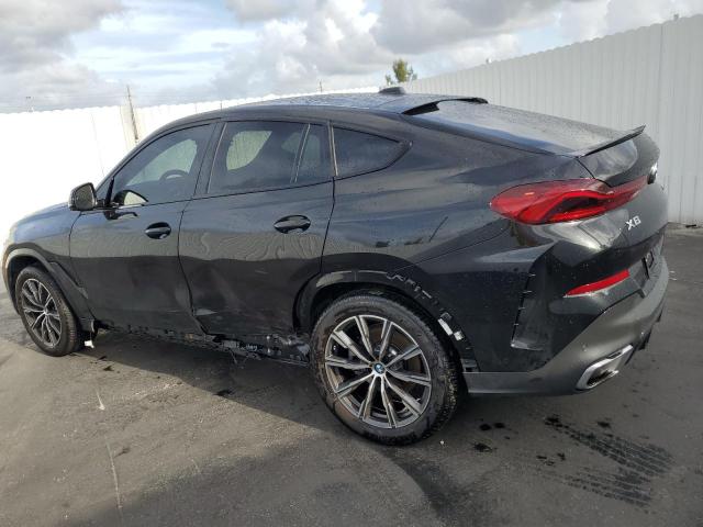 Изображение 2 2024 BMW X6 XDRIVE40I 2024 с VIN 5UX33EX04R9U39300