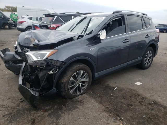 Изображение 1 2018 TOYOTA RAV4 HV LE 2018 с VIN JTMRJREV1JD243467