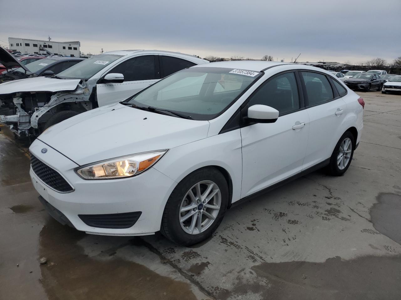 Image 1 of 2018 FORD FOCUS SE 2018 with VIN 1FADP3F29JL280370
