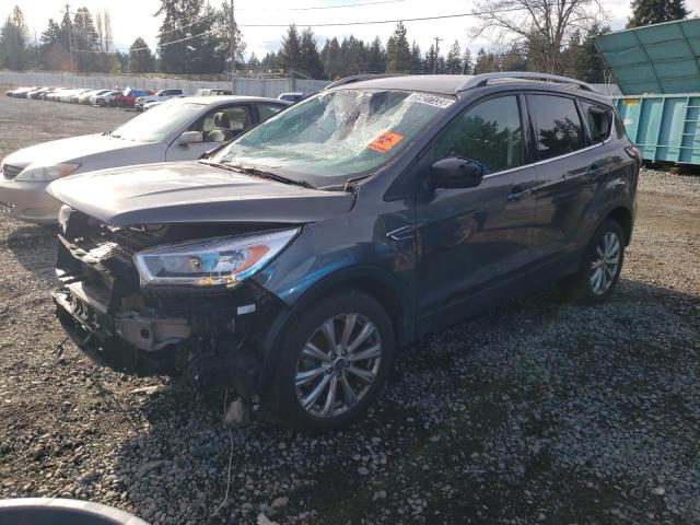 Image 1 of 2017 FORD ESCAPE TITANIUM 2017 with VIN 1FMCU9J94HUE98061