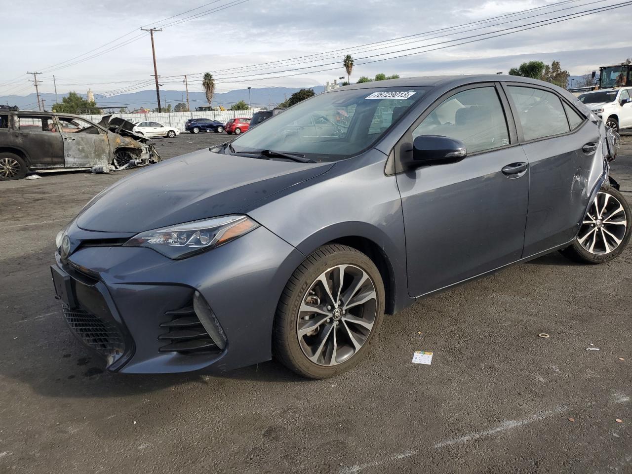 Obraz 1 z 2017 TOYOTA COROLLA L 2017 z VIN 5YFBURHE1HP608063