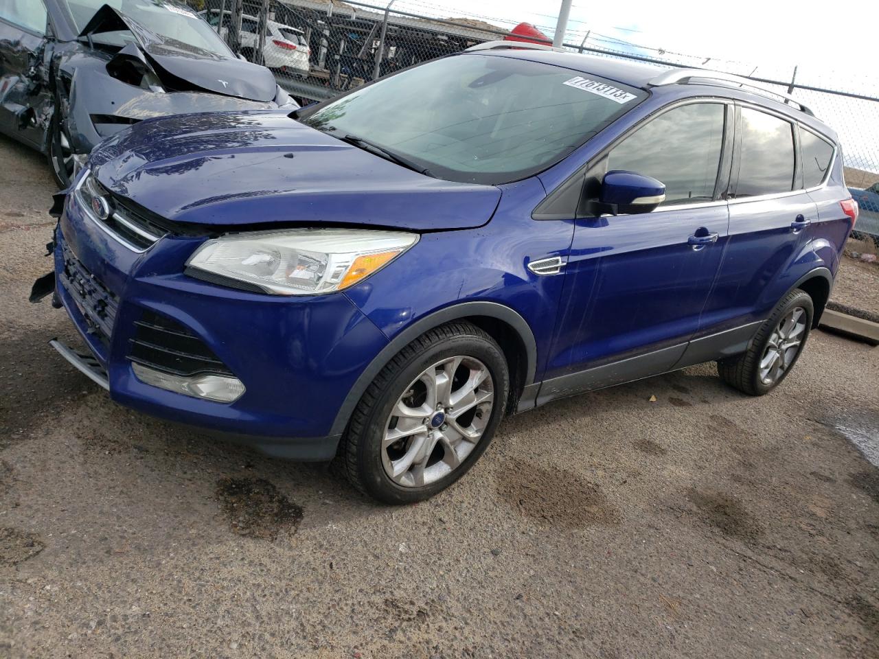 Obraz 1 z 2016 FORD ESCAPE TITANIUM 2016 z VIN 1FMCU0J90GUA44478