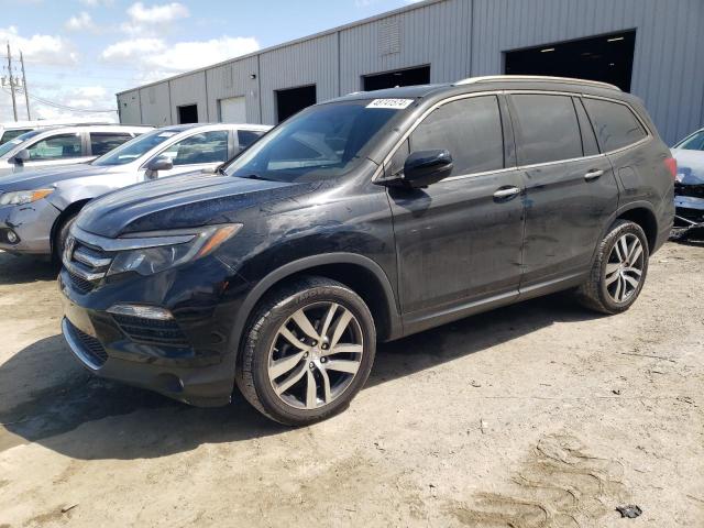 Obraz 1 z 2017 HONDA PILOT TOURING 2017 z VIN 5FNYF6H92HB047454