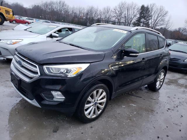 Obraz 1 z 2017 FORD ESCAPE TITANIUM 2017 z VIN 1FMCU9J97HUA16621