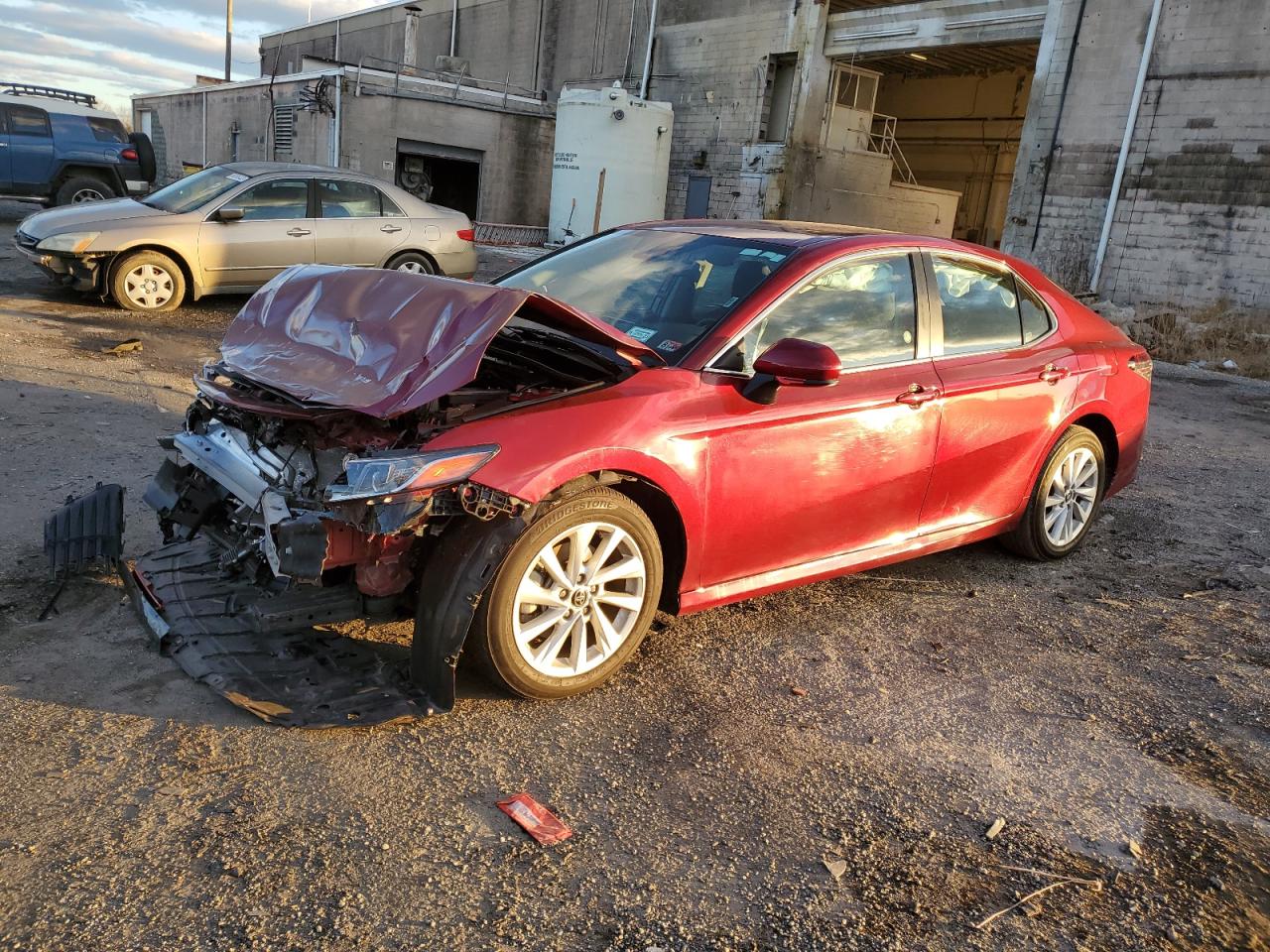 Image 1 of 2022 TOYOTA CAMRY LE 2022 with VIN 4T1C11AK6NU698769