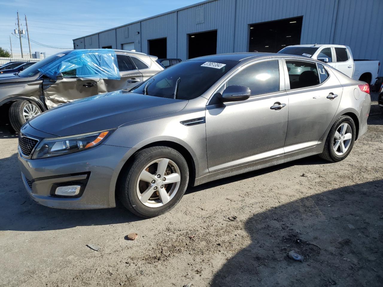 Image 1 of 2015 KIA OPTIMA LX 2015 with VIN 5XXGM4A73FG510100