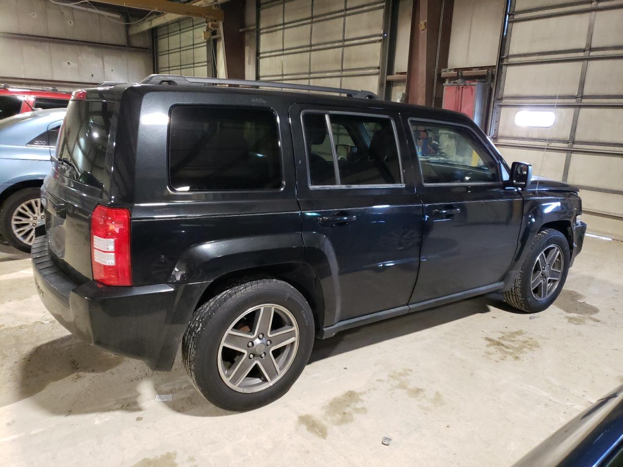 Obraz 3 z 2010 JEEP PATRIOT SPORT 2010 z VIN 1J4NF2GB9AD500895