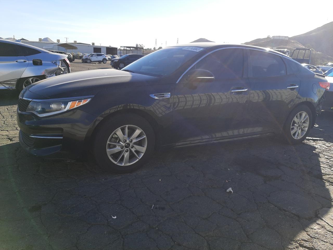 Image 1 of 2018 KIA OPTIMA LX 2018 with VIN 5XXGT4L33JG196163