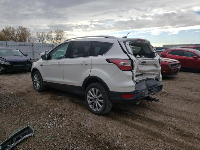Изображение 3 2017 FORD ESCAPE TITANIUM 2017 с VIN 1FMCU9J98HUB80265