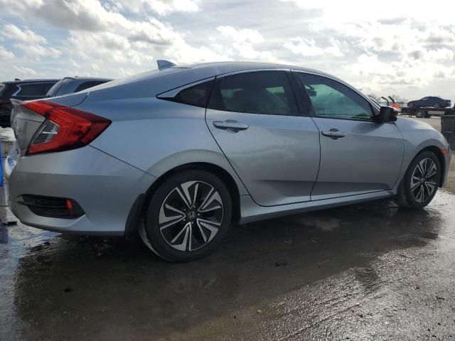 Изображение 3 2016 HONDA CIVIC EXL 2016 с VIN 19XFC1F74GE034620