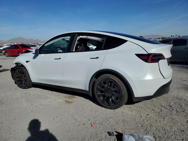 Изображение 2 2023 TESLA MODEL Y  2023 с VIN 7SAYGAEE9PF815806