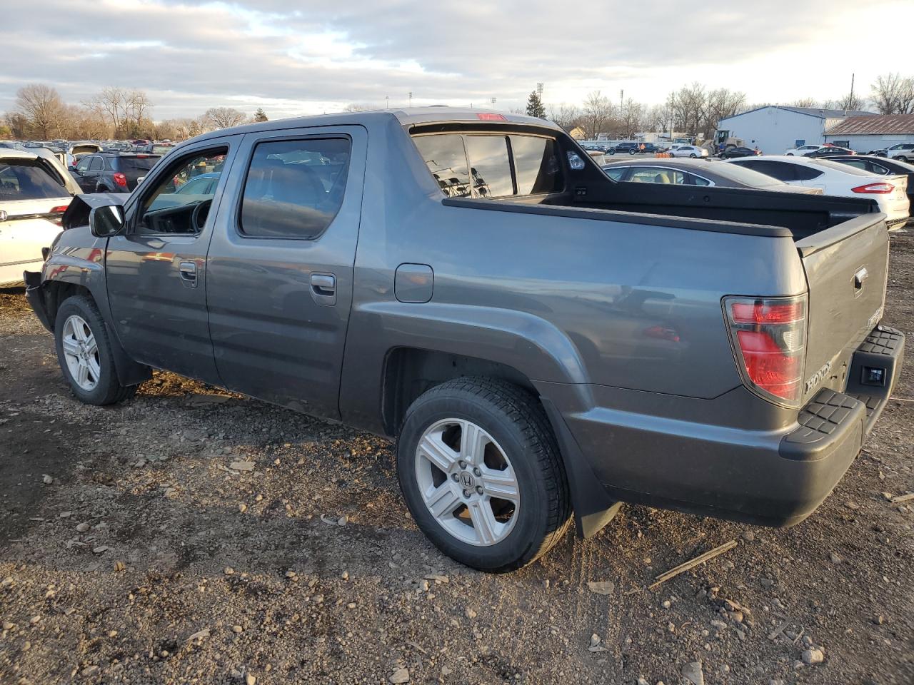 Obraz 2 z 2013 HONDA RIDGELINE RTL 2013 z VIN 5FPYK1F5XDB002617