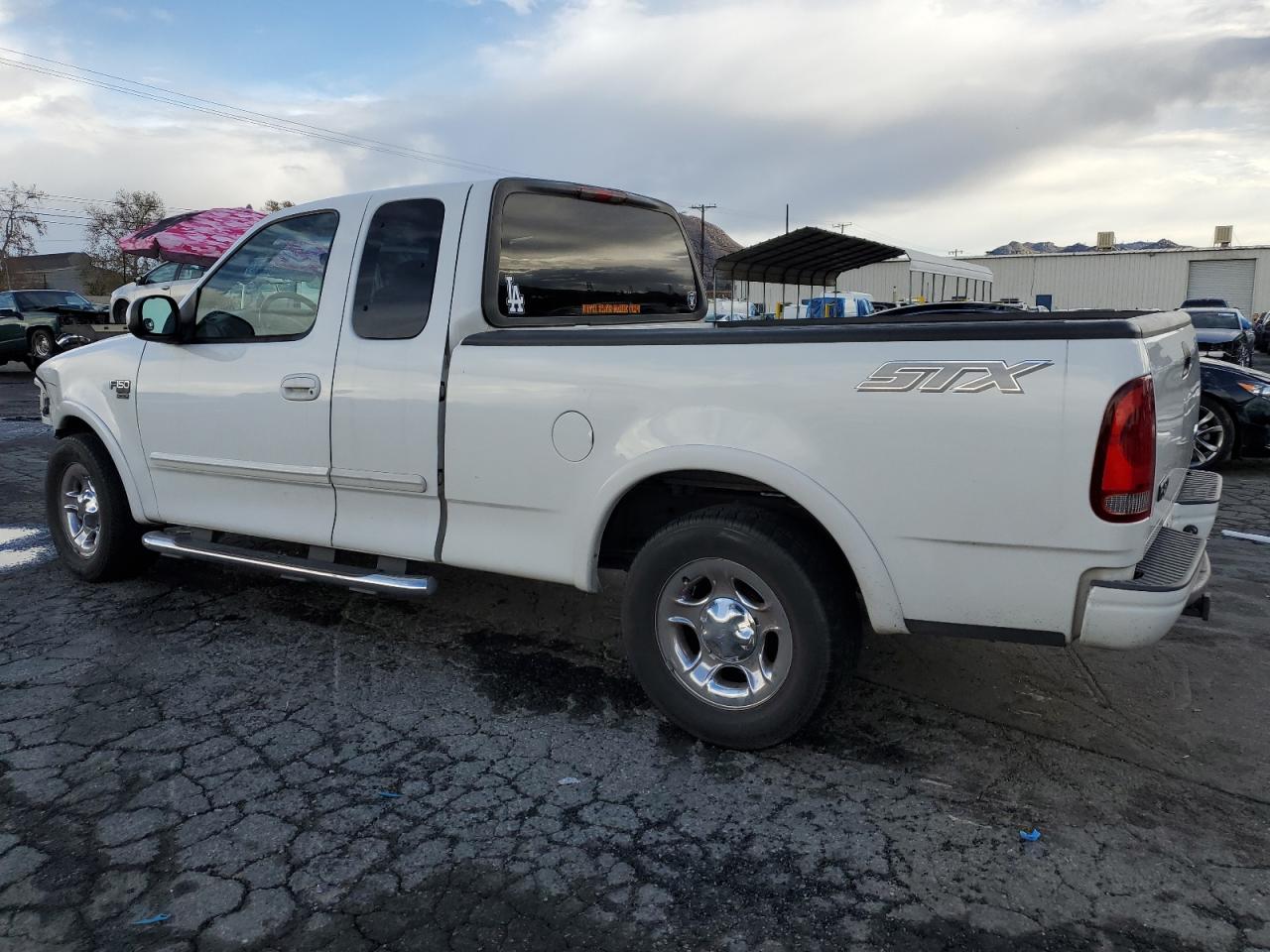 Obraz 2 z 2003 FORD F150  2003 z VIN 2FTRX17W93CA46183