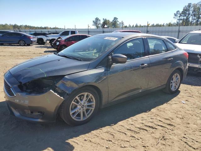 Image 1 of 2018 FORD FOCUS SE 2018 with VIN 1FADP3FE6JL214272