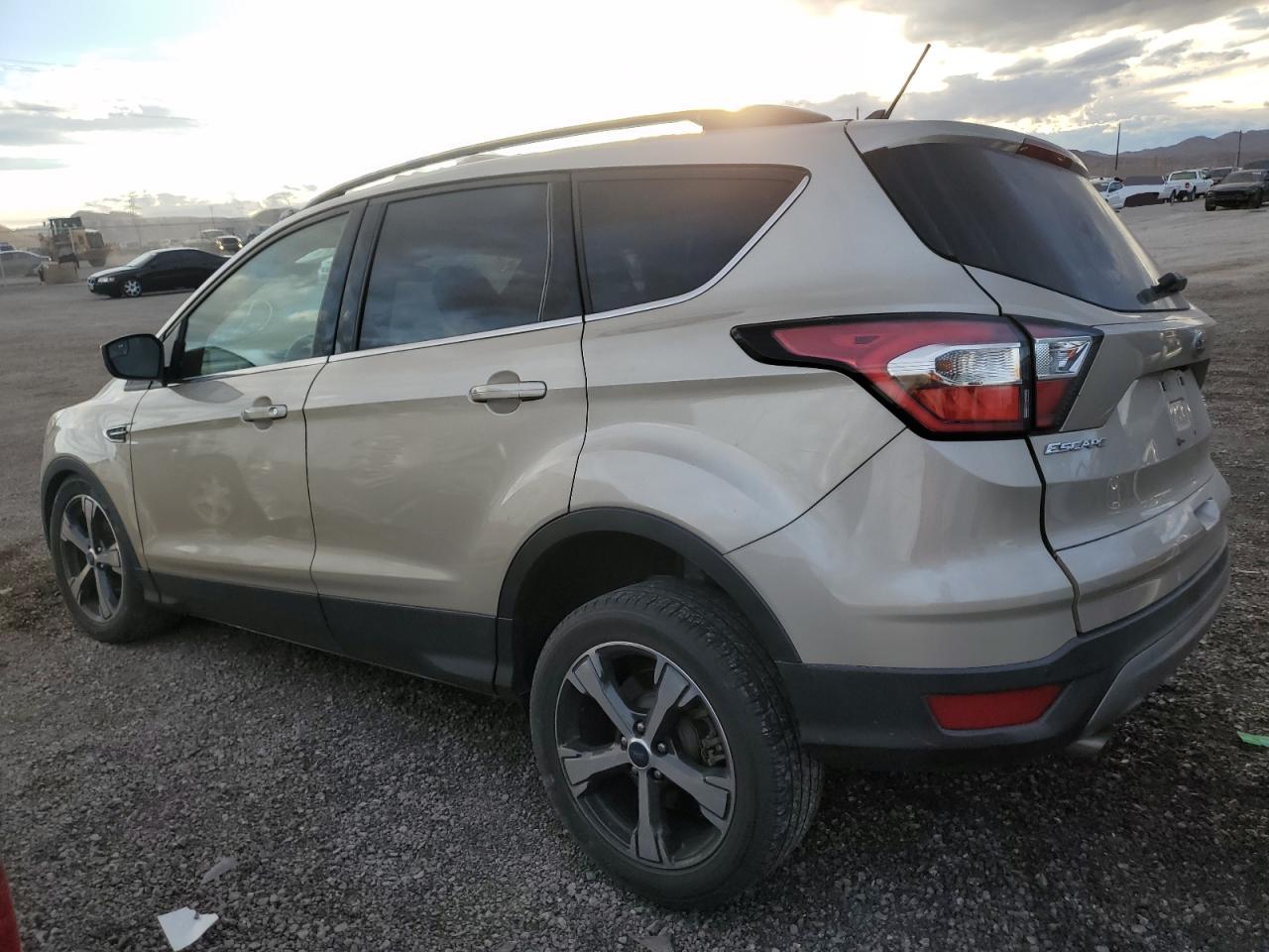 Изображение 2 2018 FORD ESCAPE SEL 2018 с VIN 1FMCU0HD0JUA04581