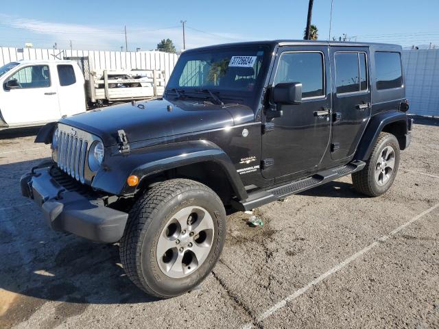 Image 1 of 2016 JEEP WRANGLER UNLIMITED SAHARA 2016 with VIN 1C4BJWEGXGL144310