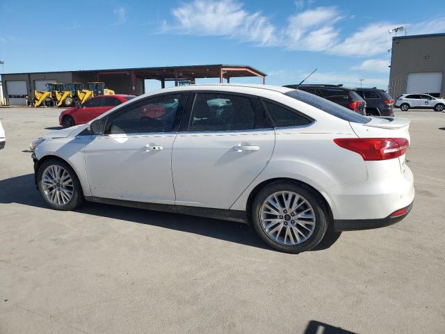 Obraz 2 z 2016 FORD FOCUS TITANIUM 2016 z VIN 1FADP3J28GL336671
