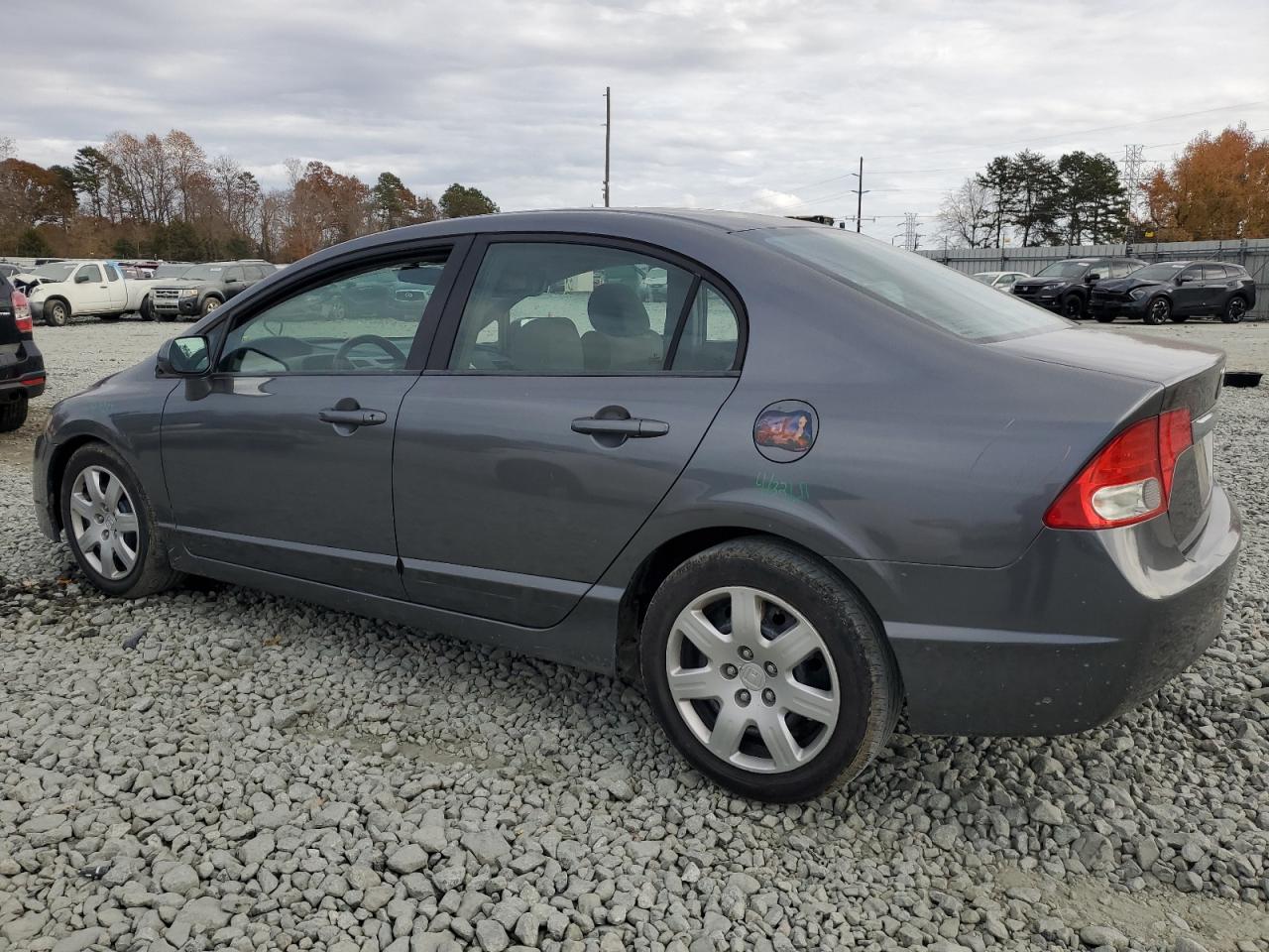 Изображение 2 2010 HONDA CIVIC LX 2010 с VIN 2HGFA1F50AH545856