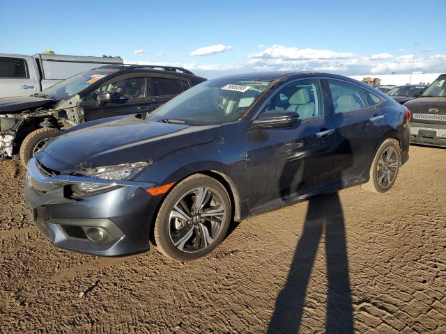 Obraz 1 z 2016 HONDA CIVIC TOURING 2016 z VIN 19XFC1F99GE221157