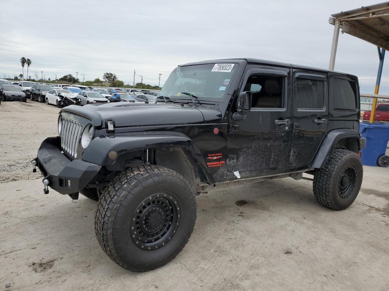 Image 1 of 2012 JEEP WRANGLER UNLIMITED SAHARA 2012 with VIN 1C4HJWEG0CL104743