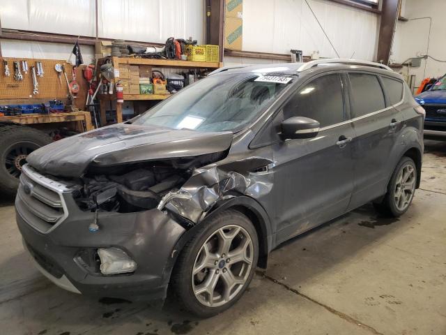 Image 1 of 2017 FORD ESCAPE TITANIUM 2017 with VIN 1FMCU9J99HUA04910