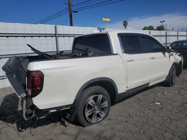 Изображение 3 2017 HONDA RIDGELINE 2017 с VIN 5FPYKSF65GB018380