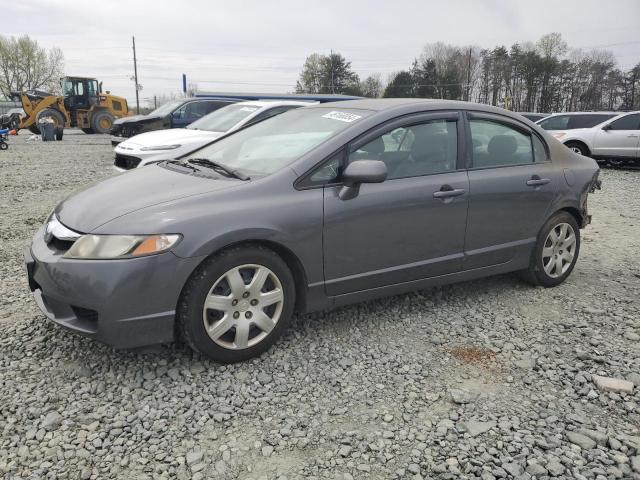 Изображение 1 2011 HONDA CIVIC LX 2011 с VIN 19XFA1F57BE049884