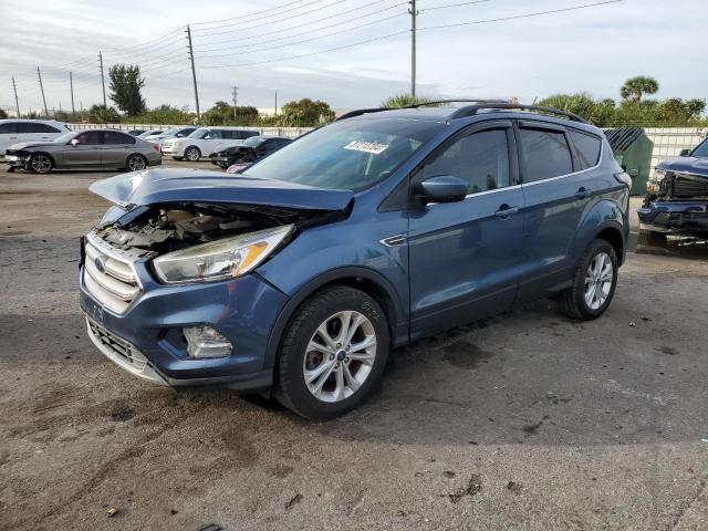 Image 1 of 2018 FORD ESCAPE SE 2018 with VIN 1FMCU9GD3JUA38732