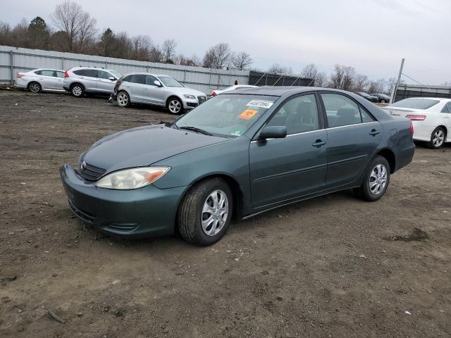 Obraz 1 z 2004 TOYOTA CAMRY LE 2004 z VIN JTDBE32K640250942