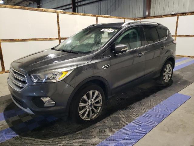 Obraz 1 z 2017 FORD ESCAPE TITANIUM 2017 z VIN 1FMCU9JD4HUB55870
