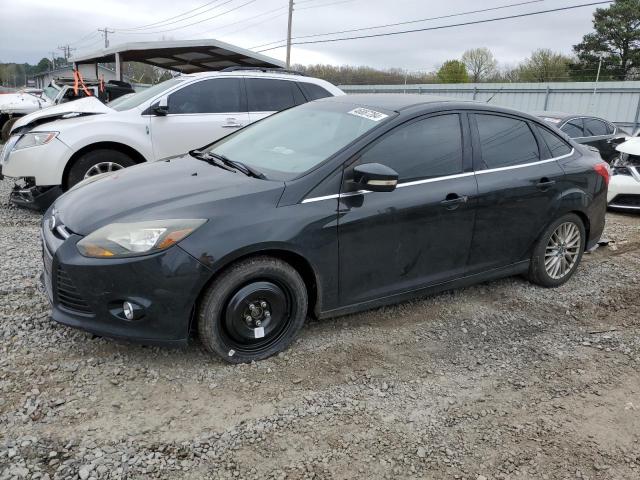 Image 1 of 2014 FORD FOCUS TITANIUM 2014 with VIN 1FADP3J20EL219762