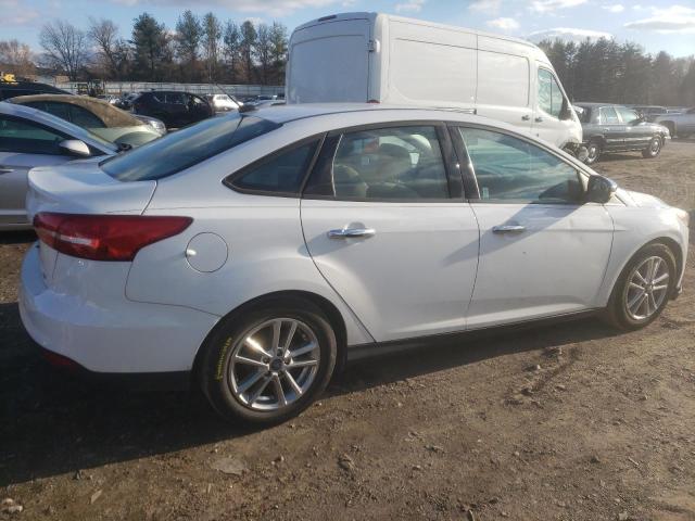 Image 3 of 2016 FORD FOCUS SE 2016 with VIN 1FADP3F20GL242440