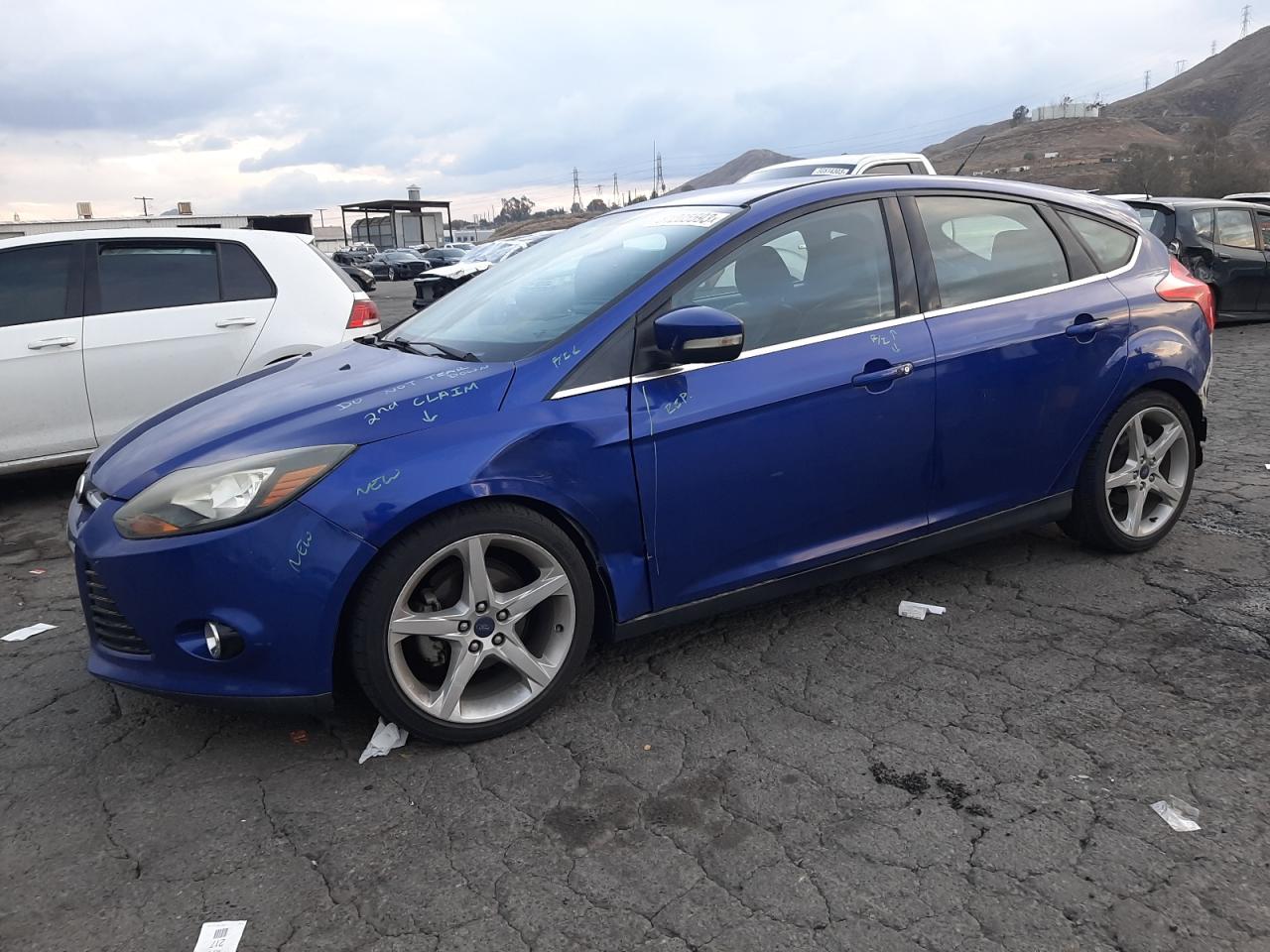 Obraz 1 z 2014 FORD FOCUS TITANIUM 2014 z VIN 1FADP3N24EL198649