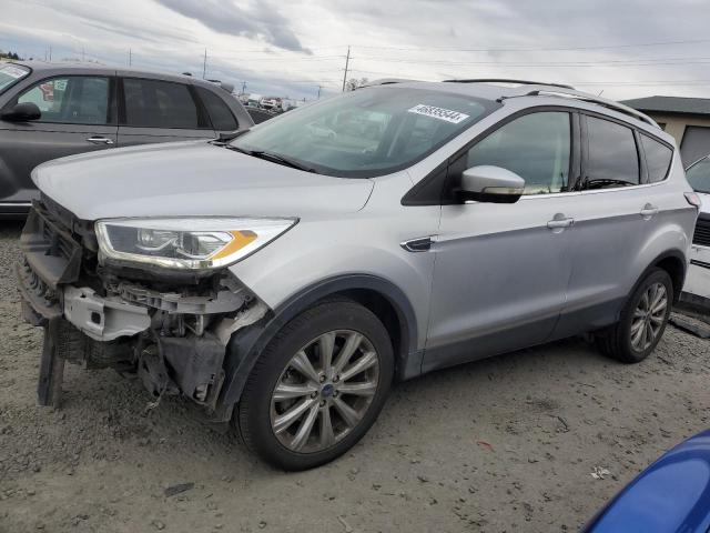 Image 1 of 2017 FORD ESCAPE TITANIUM 2017 with VIN 1FMCU9J99HUA15549