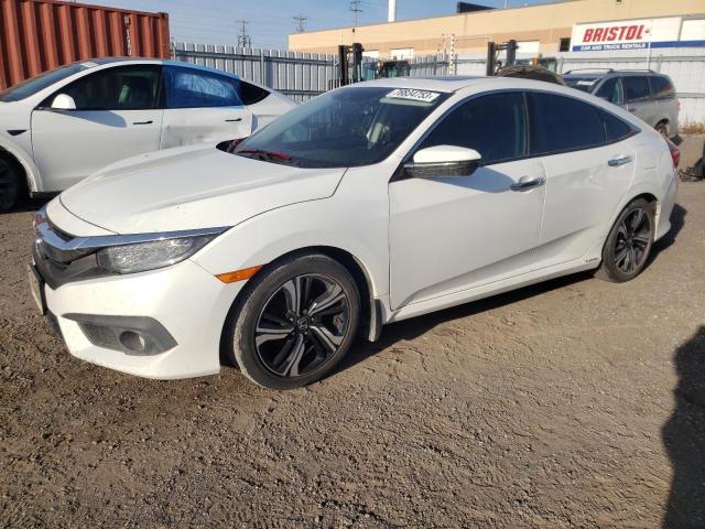 Image 1 of 2017 HONDA CIVIC TOURING 2017 with VIN 2HGFC1F97HH104300