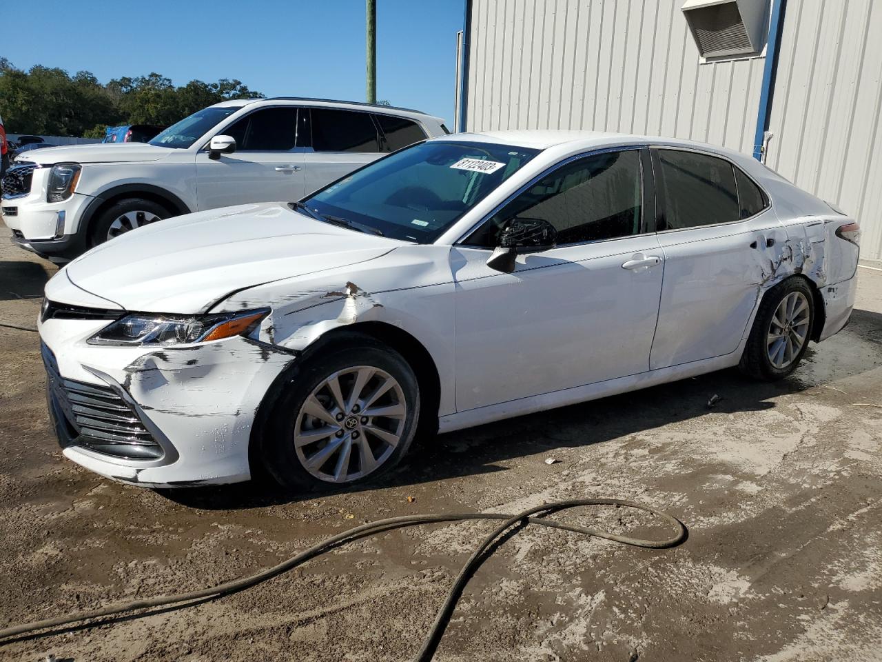 Obraz 1 z 2021 TOYOTA CAMRY LE 2021 z VIN 4T1C11AK9MU478668