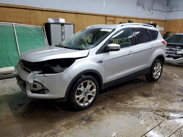 Image 1 of 2016 FORD ESCAPE TITANIUM 2016 with VIN 1FMCU9JX0GUC77313