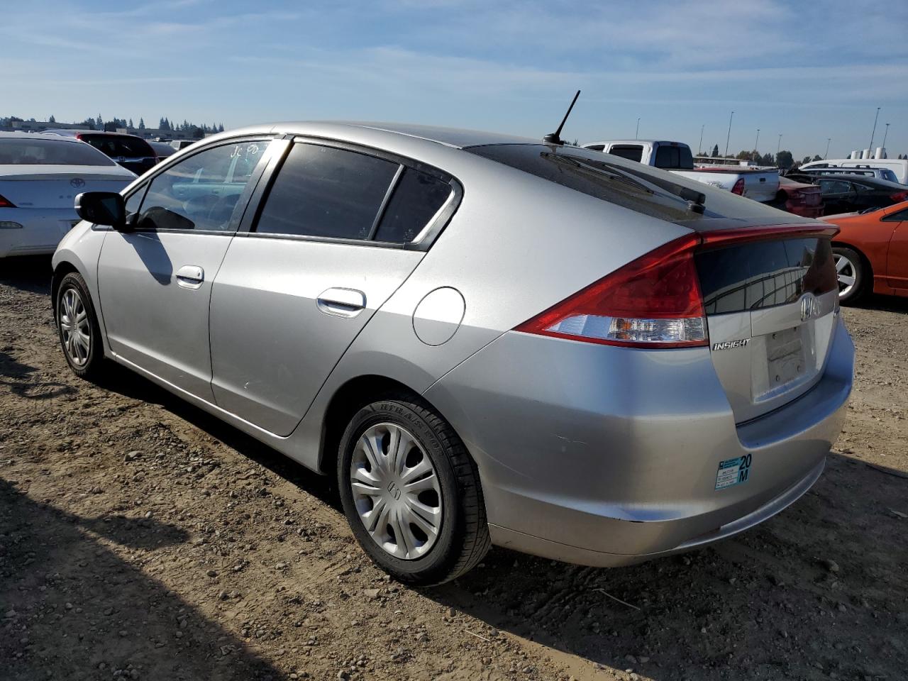 Изображение 2 Honda Insight Lx 2010 с VIN JHMZE2H56AS022240