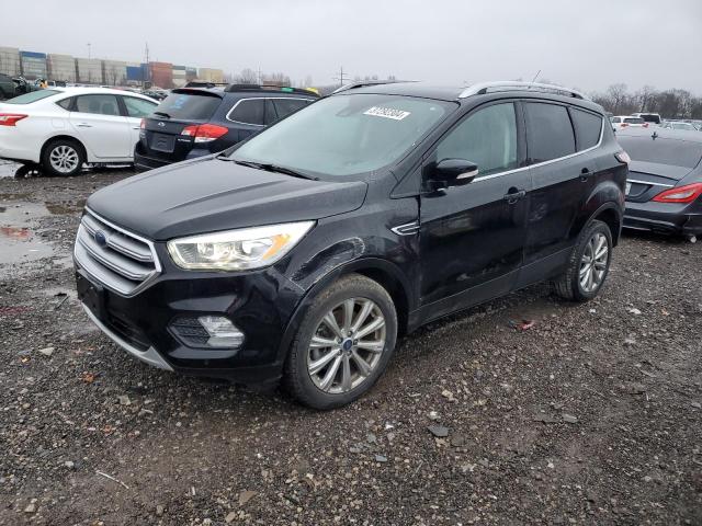 Obraz 1 z 2017 FORD ESCAPE TITANIUM 2017 z VIN 1FMCU9JD2HUE32953