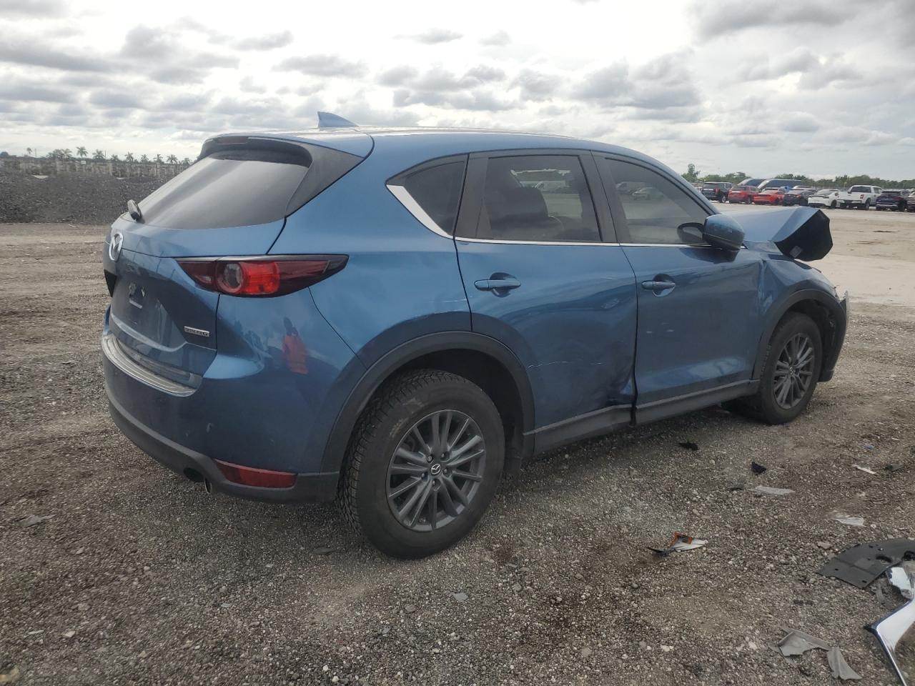 Image 3 of 2021 MAZDA CX-5 TOURING 2021 with VIN JM3KFACM5M0413105