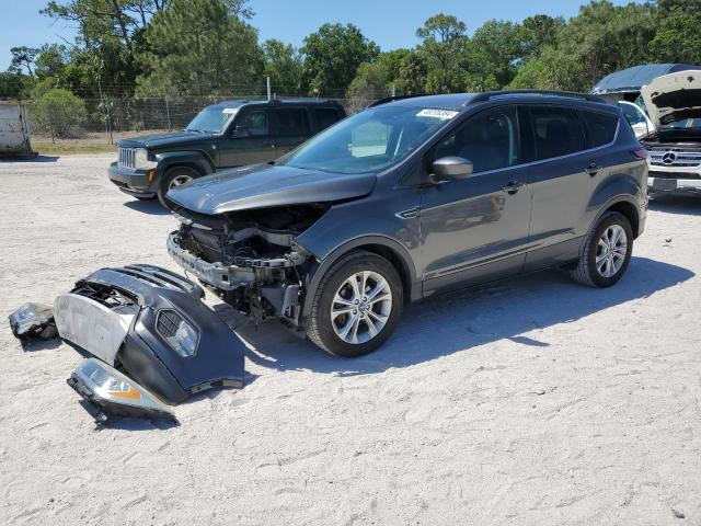 Obraz 1 z 2017 FORD ESCAPE SE 2017 z VIN 1FMCU0GDXHUD15897