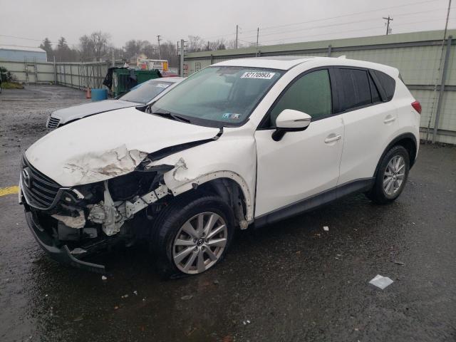 Image 1 of 2016 MAZDA CX-5 TOURING 2016 with VIN JM3KE4CY3G0893043