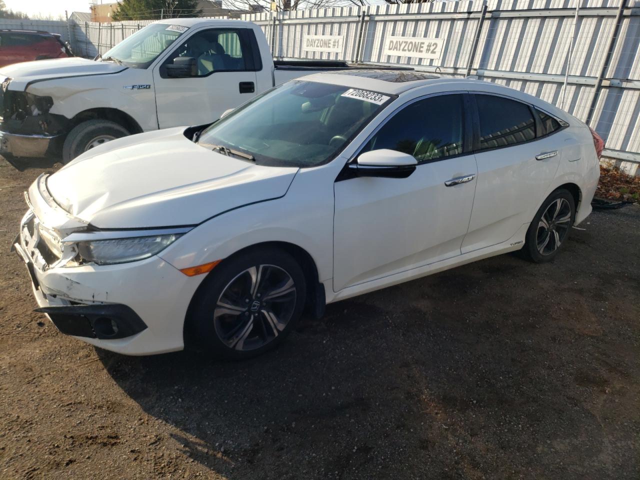 Image 1 of Honda Civic Touring 2016 with VIN 2HGFC1F99GH101011
