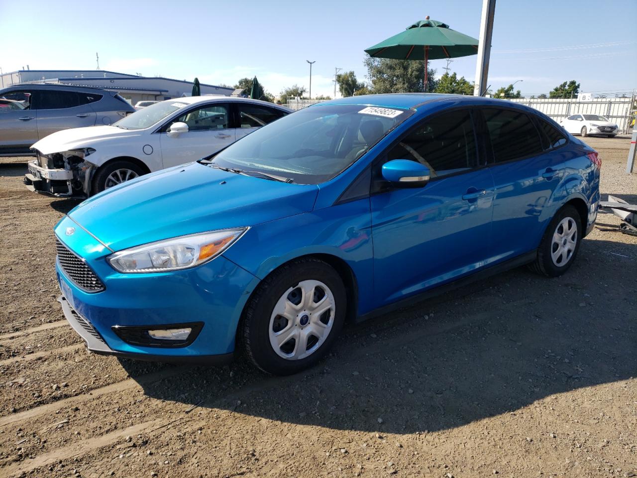 Obraz 1 z 2017 FORD FOCUS SE 2017 z VIN 1FADP3F21HL211182