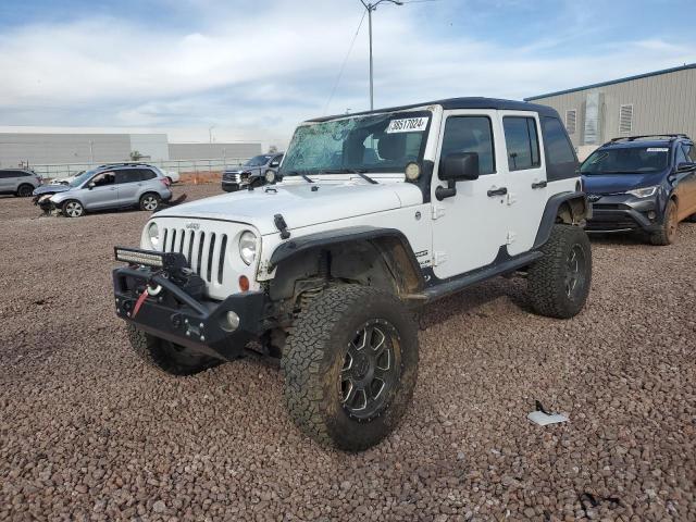 Obraz 1 z 2013 JEEP WRANGLER UNLIMITED SPORT 2013 z VIN 1C4BJWDG0DL694046