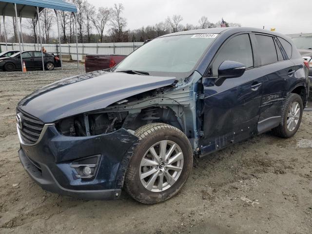 Obraz 1 z 2016 MAZDA CX-5 TOURING 2016 z VIN JM3KE2CY4G0912025