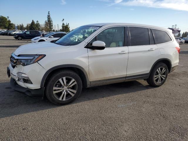 Image 1 of 2018 HONDA PILOT EX 2018 with VIN 5FNYF5H30JB017557