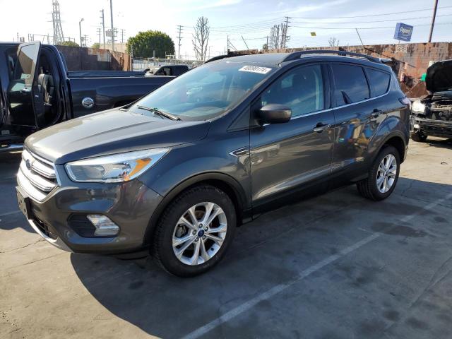 Image 1 of 2018 FORD ESCAPE SE 2018 with VIN 1FMCU0GD3JUA56546