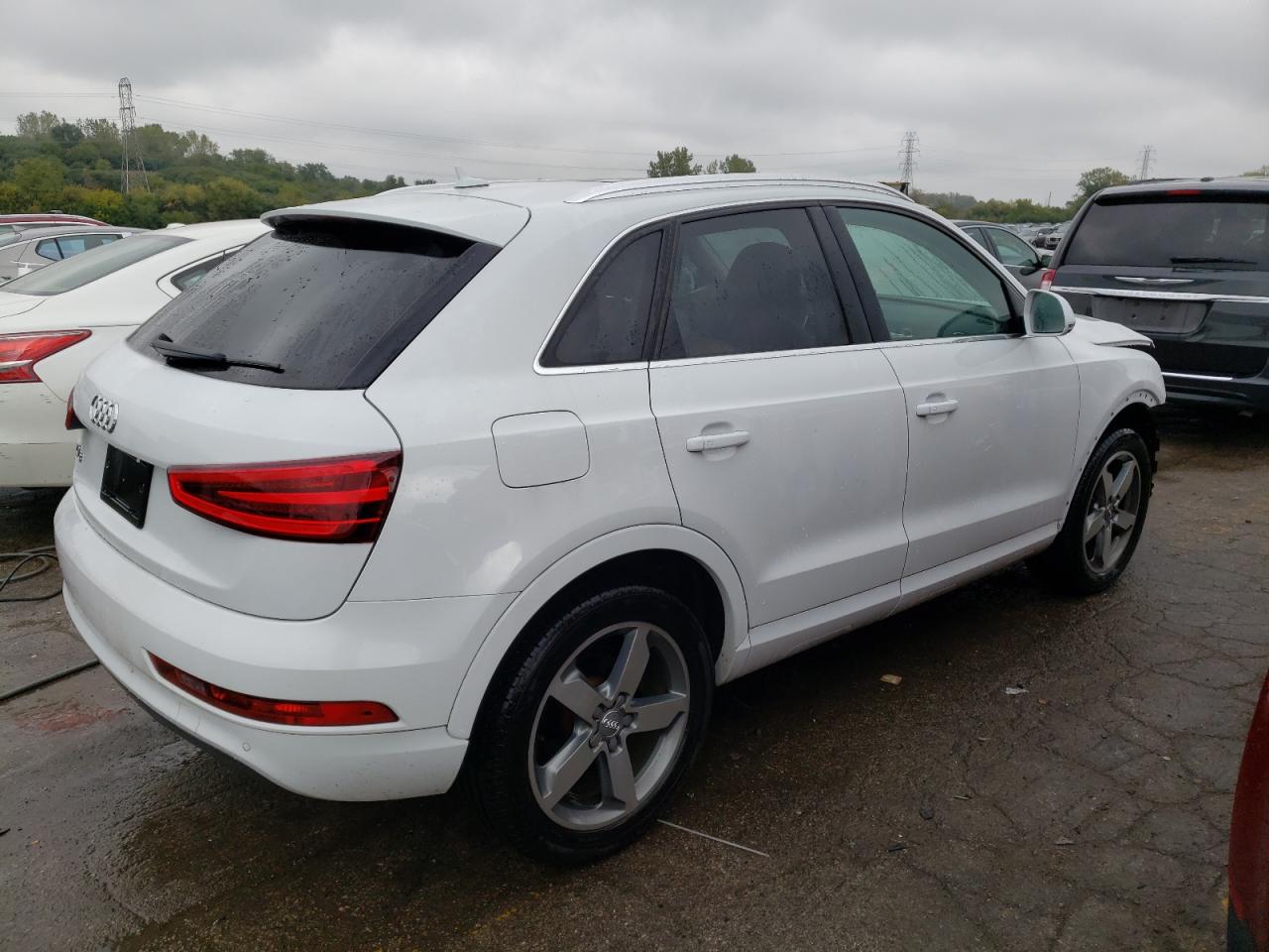 Image 3 of 2015 AUDI Q3 PRESTIGE 2015 with VIN WA1FFCFS2FR010739