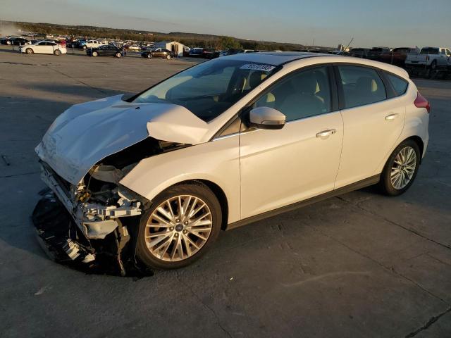 Image 1 of 2016 FORD FOCUS TITANIUM 2016 with VIN 1FADP3N27GL230769